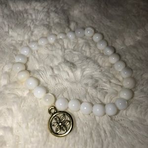 Simple White And Gold charmed bracelet